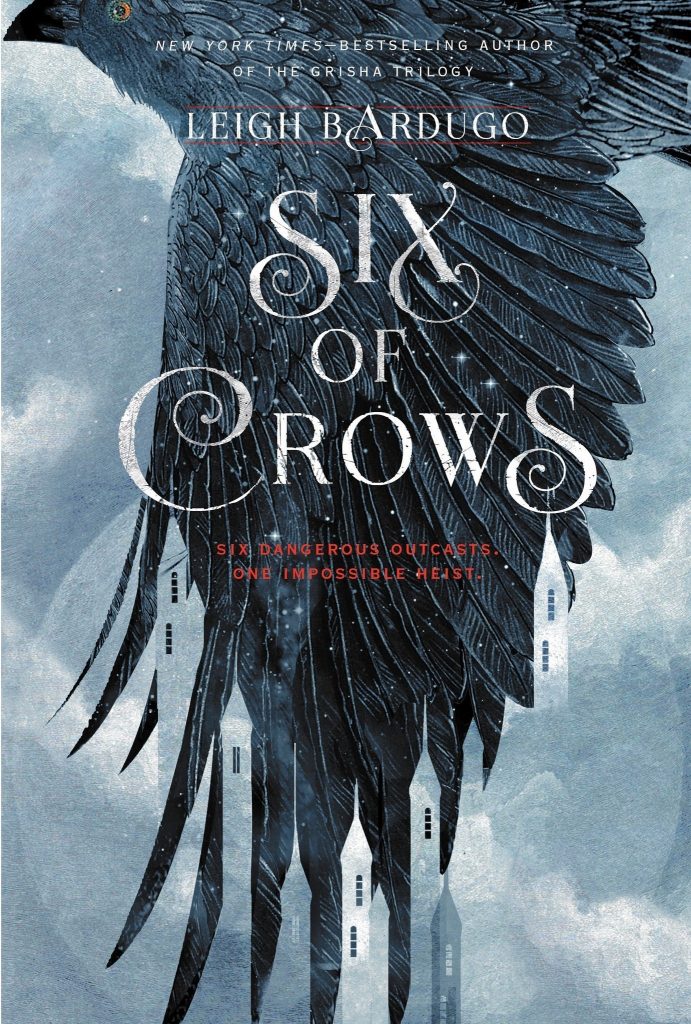 Book cover of Leigh Bardugo's "Six of Crows," featuring a stylized outstretched wing of a crow against a clouded backdrop